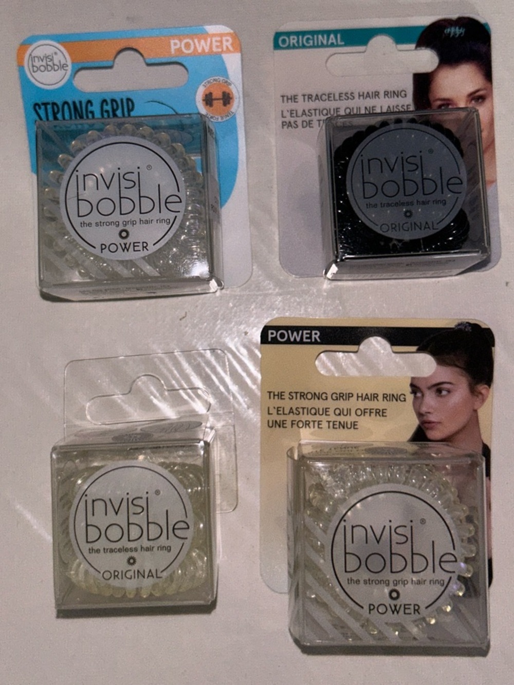 Hair Tie Bundle Power Strong Grip Hair Ring - Clear and Black (4 Packs)